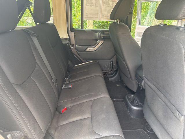 used 2014 Jeep Wrangler Unlimited car, priced at $12,246
