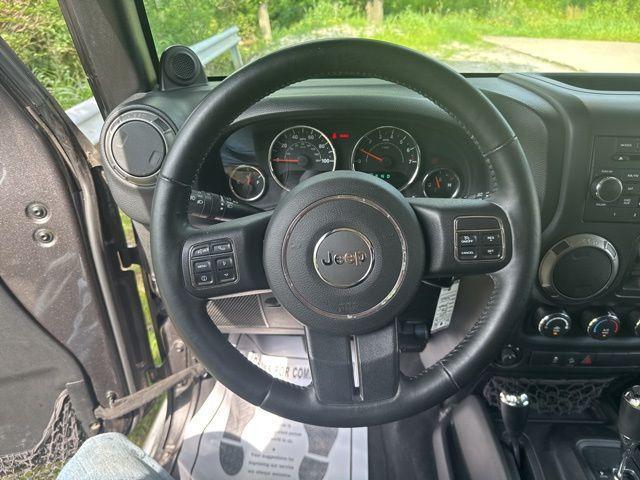 used 2014 Jeep Wrangler Unlimited car, priced at $12,246