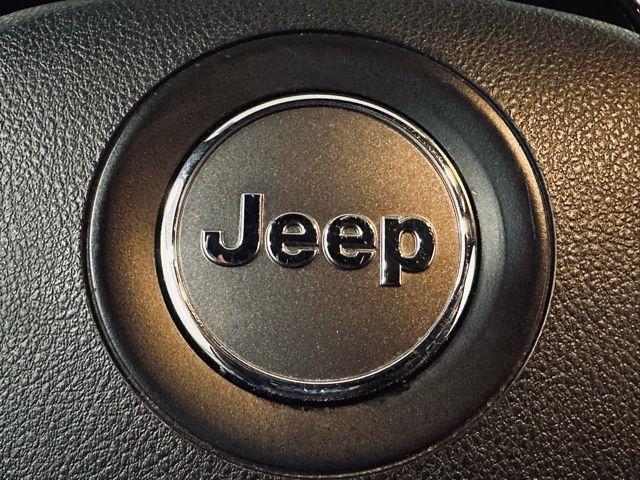 used 2018 Jeep Grand Cherokee car, priced at $15,303