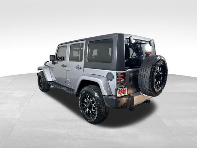 used 2015 Jeep Wrangler Unlimited car, priced at $17,585