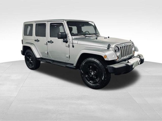 used 2013 Jeep Wrangler Unlimited car, priced at $15,900