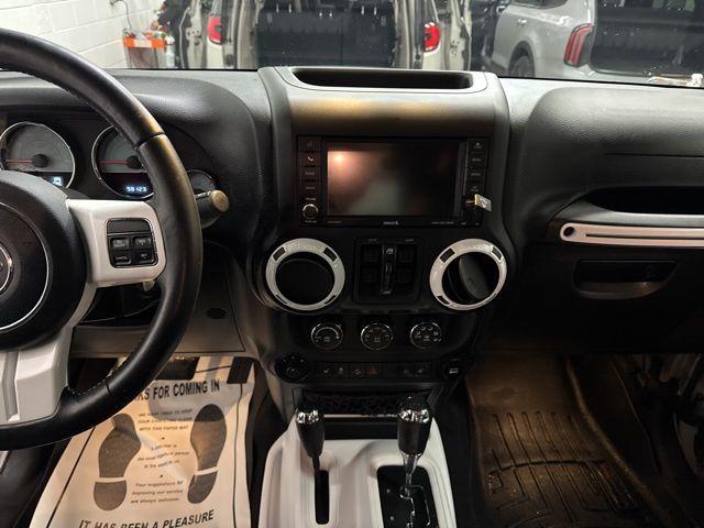 used 2014 Jeep Wrangler Unlimited car, priced at $18,507