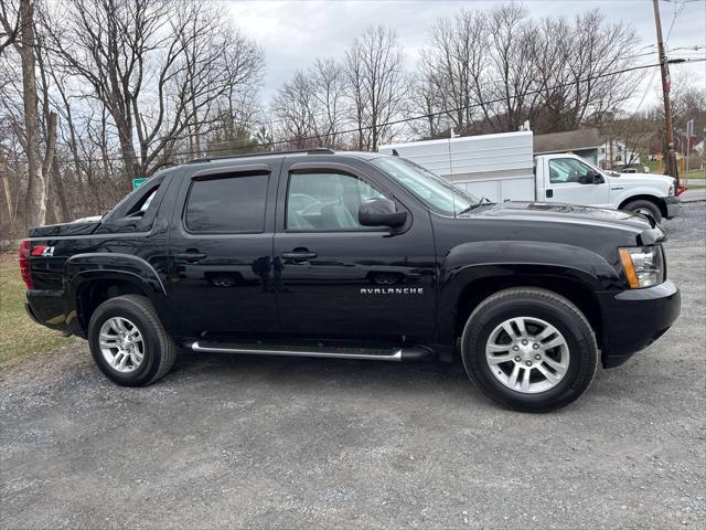 used 2013 Chevrolet Avalanche car, priced at $17,995