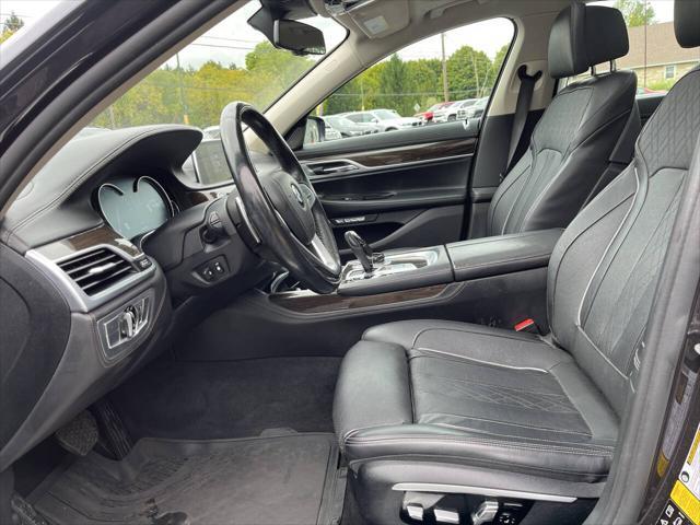 used 2016 BMW 750 car, priced at $18,995