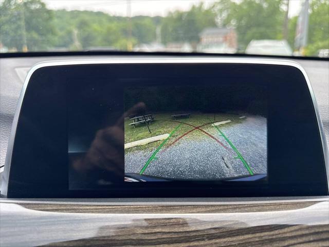 used 2018 BMW X1 car, priced at $14,895