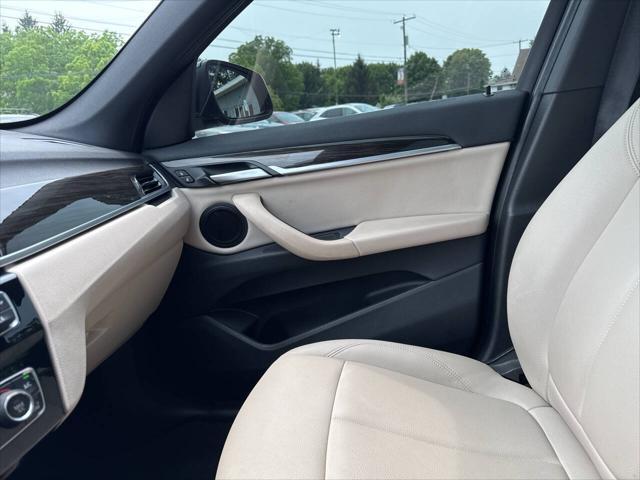 used 2018 BMW X1 car, priced at $14,895