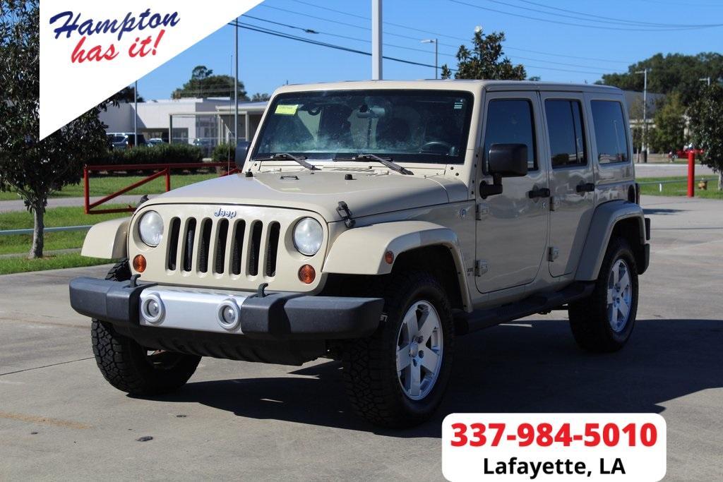 used 2011 Jeep Wrangler Unlimited car, priced at $15,995