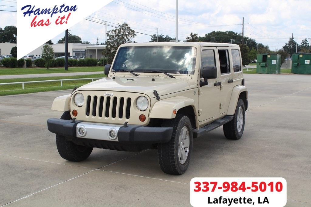 used 2011 Jeep Wrangler Unlimited car, priced at $15,995