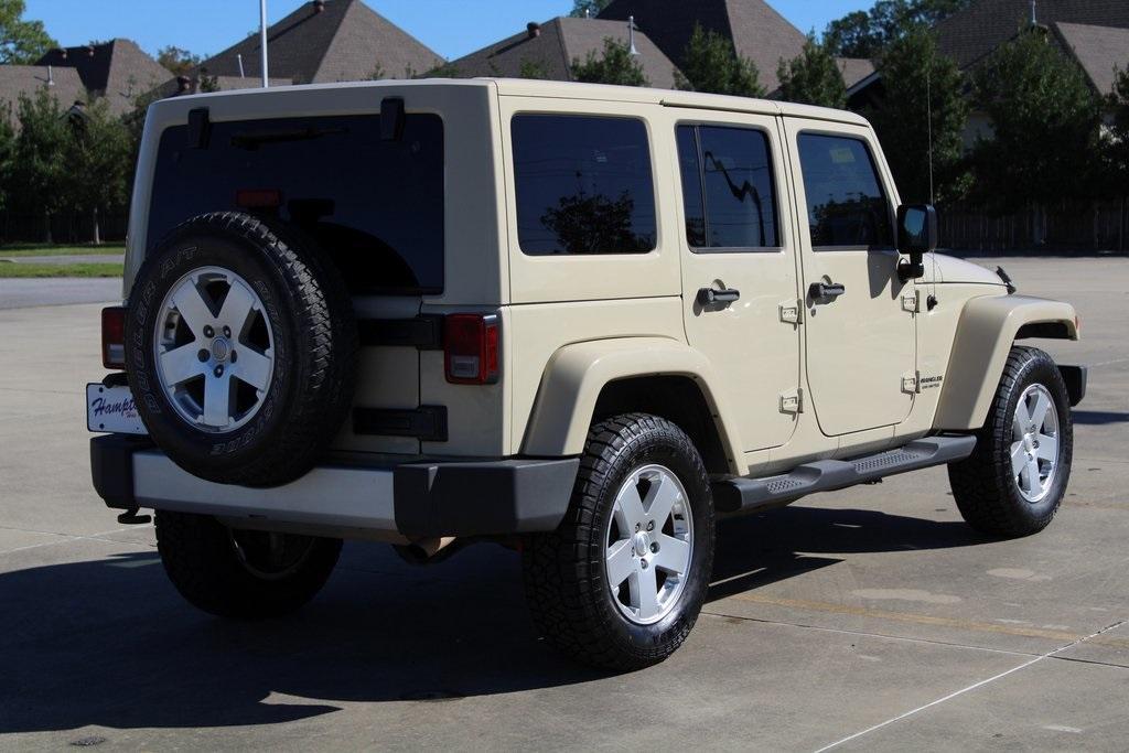 used 2011 Jeep Wrangler Unlimited car, priced at $15,995