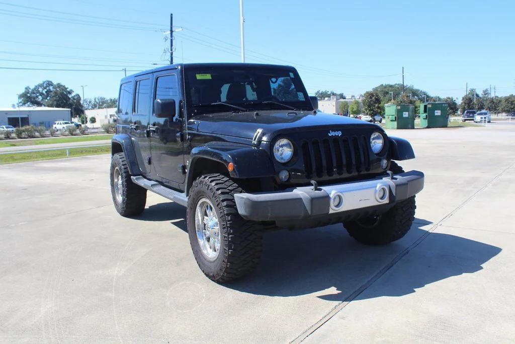 used 2015 Jeep Wrangler Unlimited car, priced at $16,999