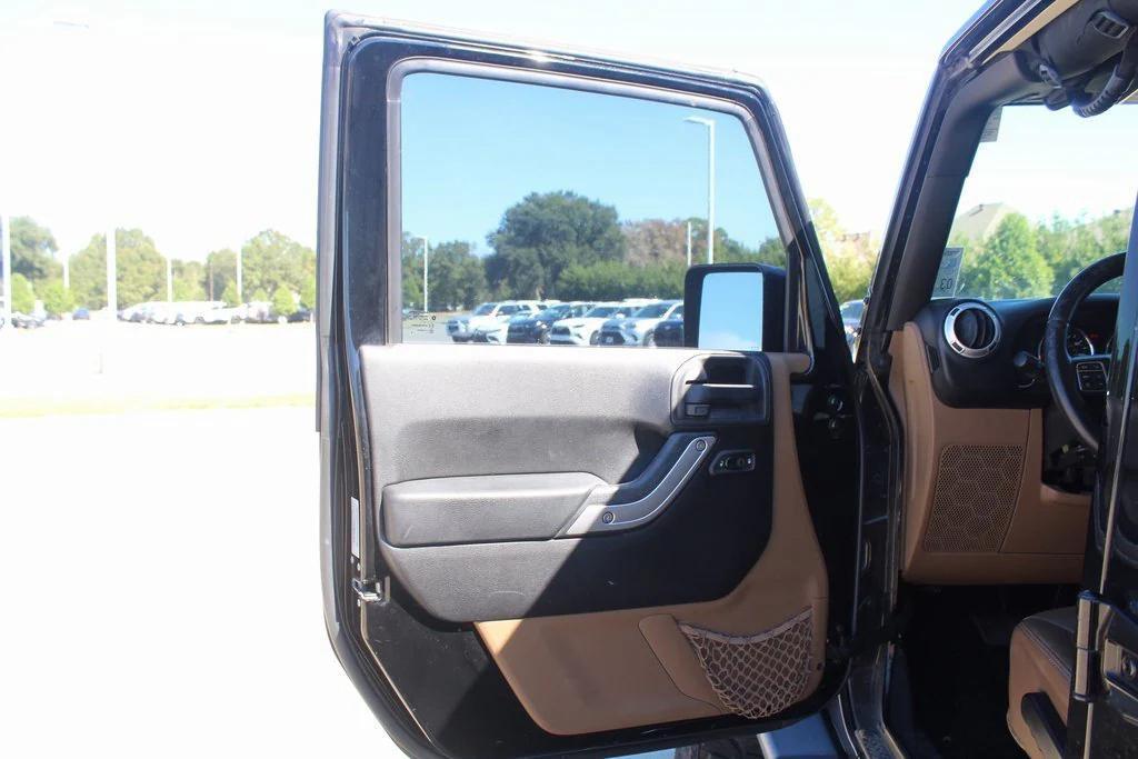 used 2015 Jeep Wrangler Unlimited car, priced at $16,999