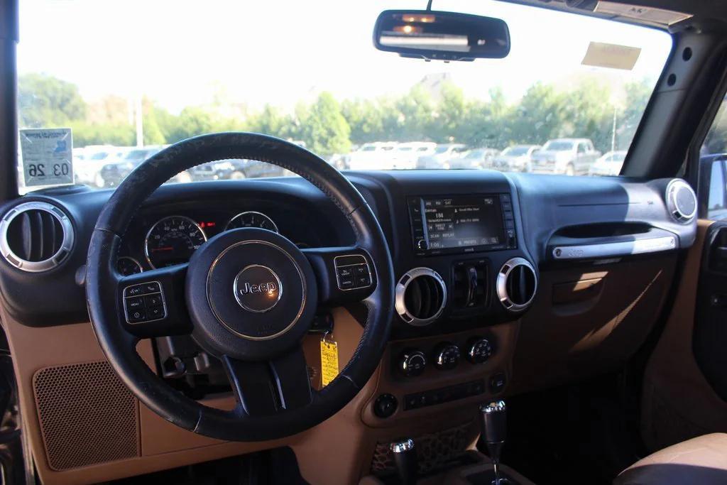 used 2015 Jeep Wrangler Unlimited car, priced at $16,999