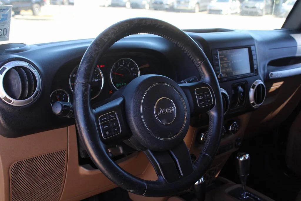 used 2015 Jeep Wrangler Unlimited car, priced at $16,999