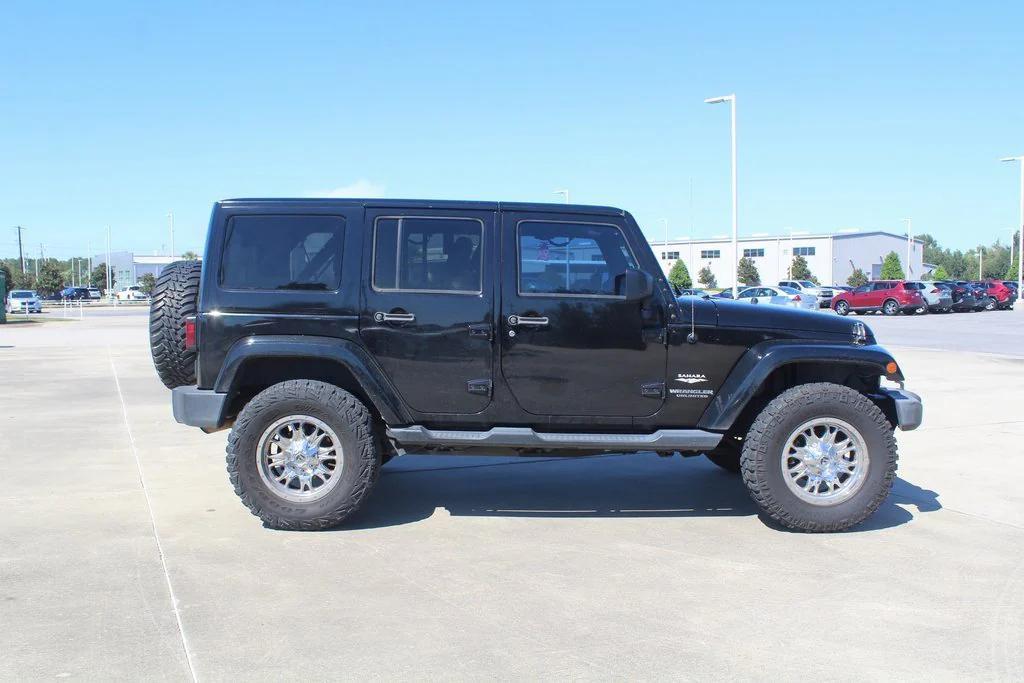 used 2015 Jeep Wrangler Unlimited car, priced at $16,999