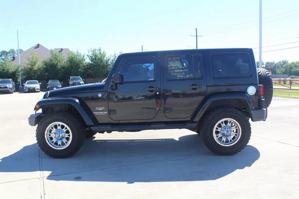 used 2015 Jeep Wrangler Unlimited car, priced at $16,999