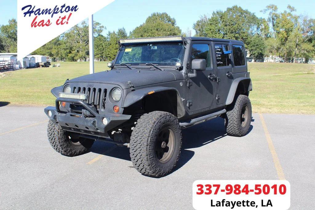 used 2013 Jeep Wrangler Unlimited car, priced at $12,000