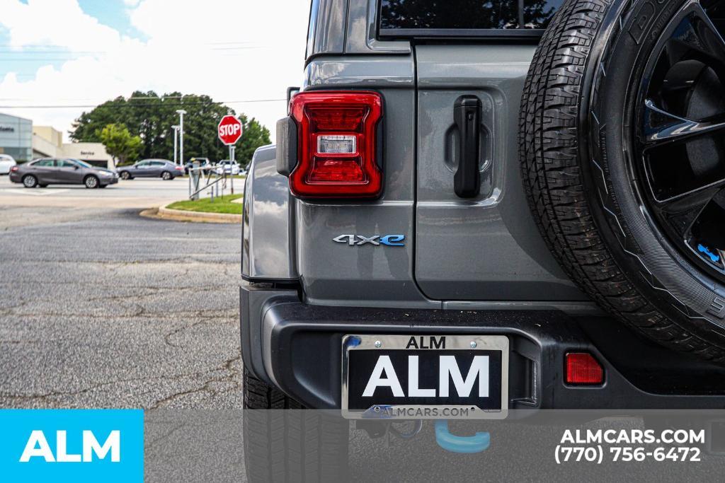 used 2023 Jeep Wrangler 4xe car, priced at $31,420