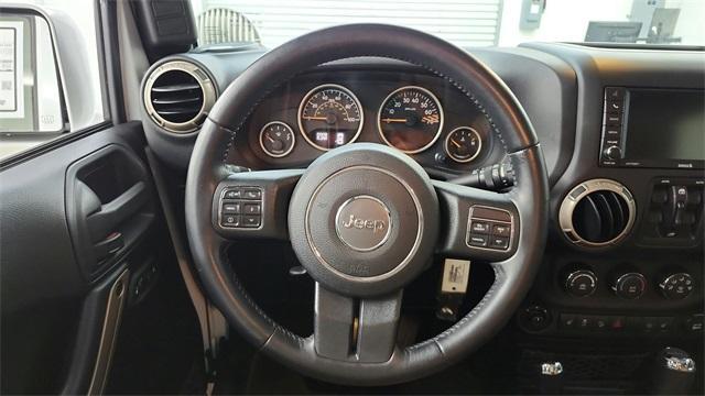 used 2016 Jeep Wrangler Unlimited car, priced at $22,389