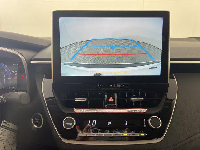 new 2025 Toyota Corolla Hybrid car, priced at $30,373