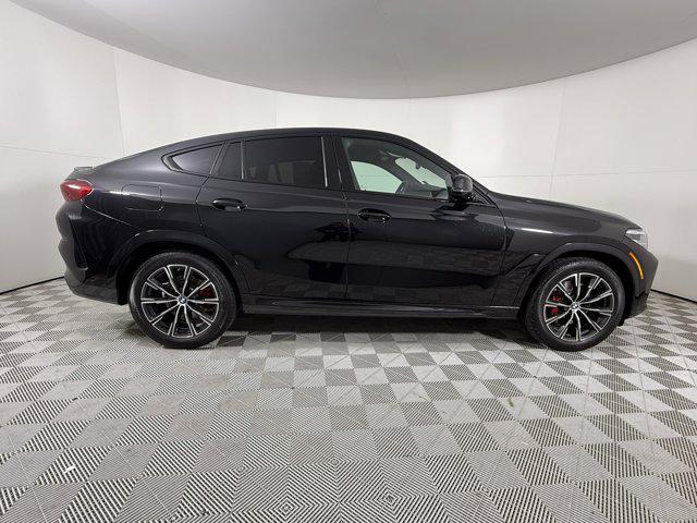used 2023 BMW X6 car, priced at $65,900