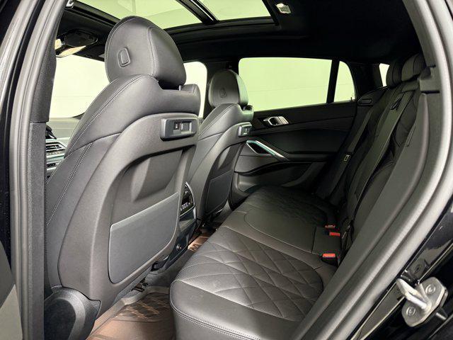 used 2023 BMW X6 car, priced at $65,900