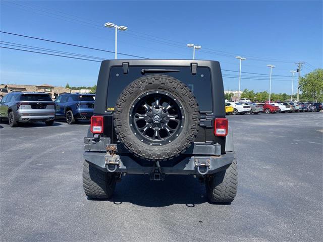 used 2012 Jeep Wrangler Unlimited car, priced at $15,900