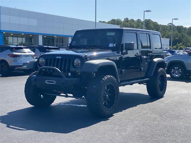 used 2012 Jeep Wrangler Unlimited car, priced at $15,900