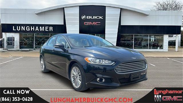 used 2014 Ford Fusion car, priced at $9,900