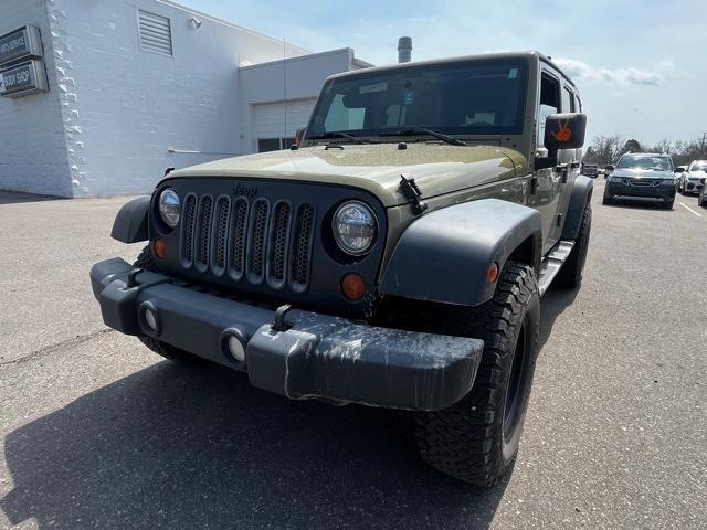 used 2013 Jeep Wrangler Unlimited car, priced at $12,300