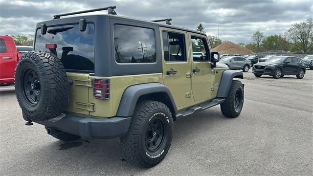 used 2013 Jeep Wrangler Unlimited car, priced at $10,700