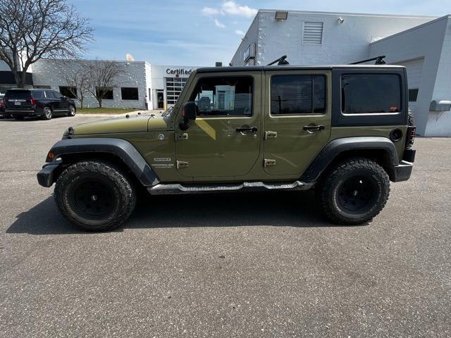 used 2013 Jeep Wrangler Unlimited car, priced at $12,300