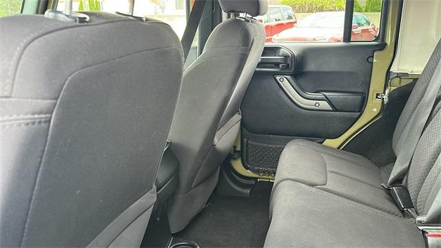 used 2013 Jeep Wrangler Unlimited car, priced at $10,700