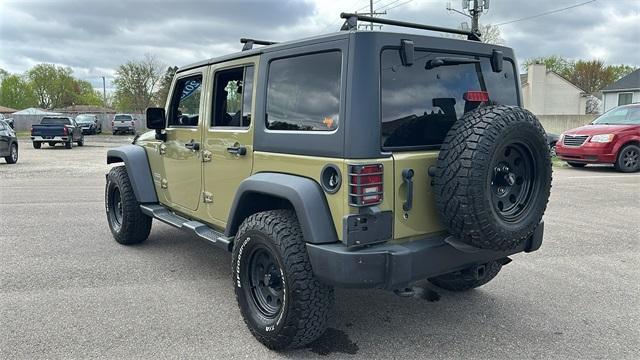 used 2013 Jeep Wrangler Unlimited car, priced at $10,700