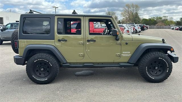 used 2013 Jeep Wrangler Unlimited car, priced at $10,700