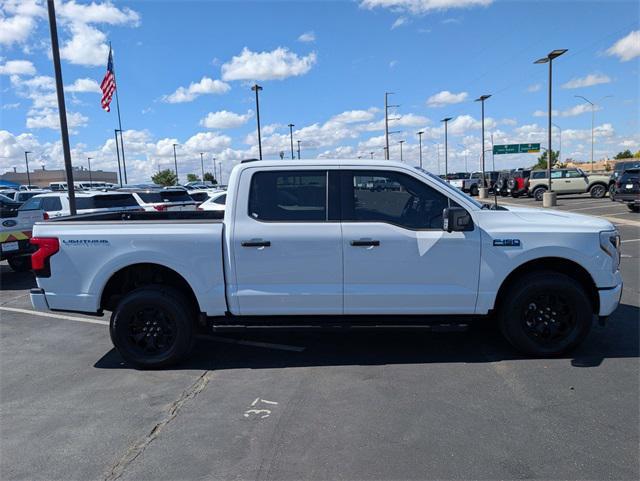 used 2025 Ford F-150 Lightning car, priced at $51,995