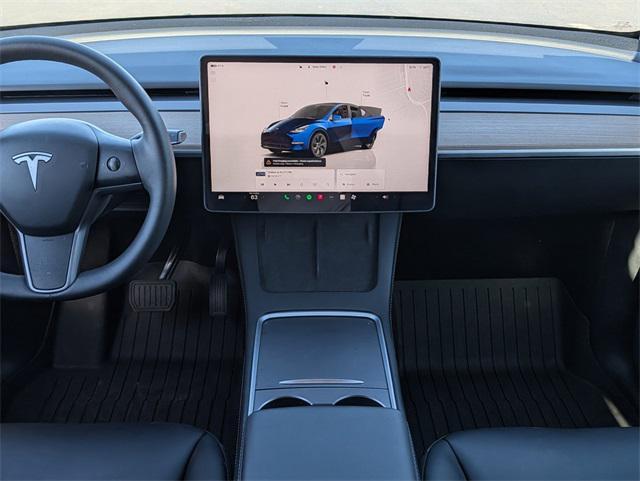 used 2024 Tesla Model Y car, priced at $34,995