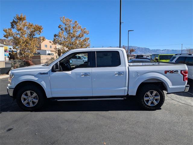 used 2018 Ford F-150 car, priced at $27,803