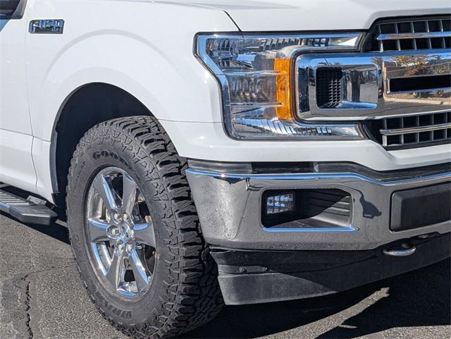 used 2018 Ford F-150 car, priced at $27,803