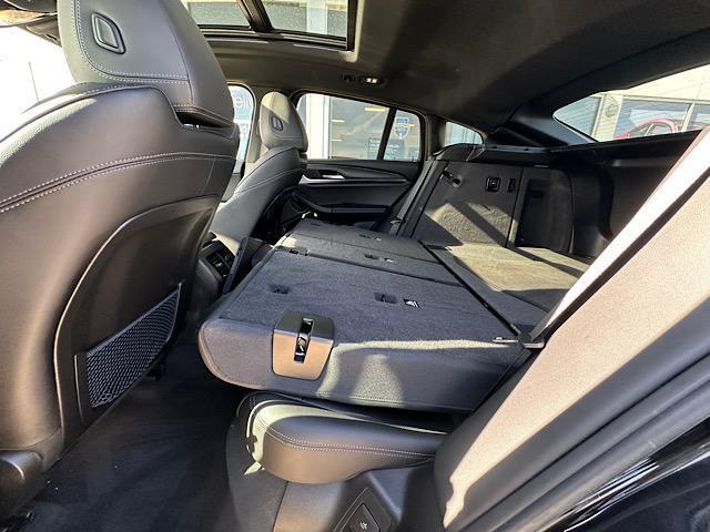 used 2023 BMW X4 car, priced at $46,900