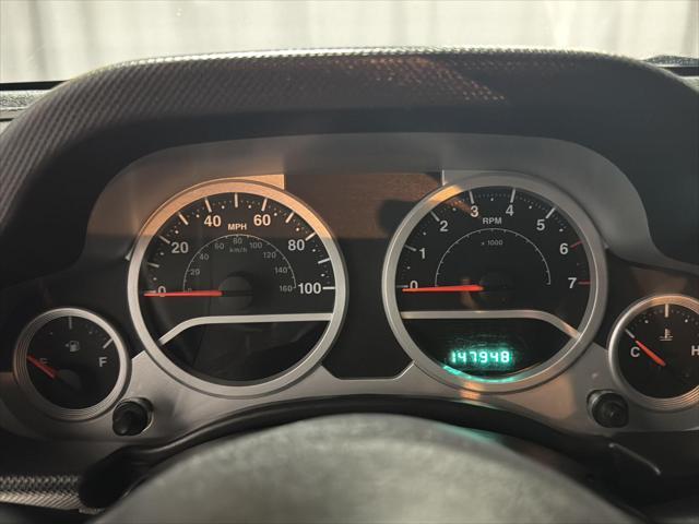 used 2010 Jeep Wrangler Unlimited car, priced at $13,995