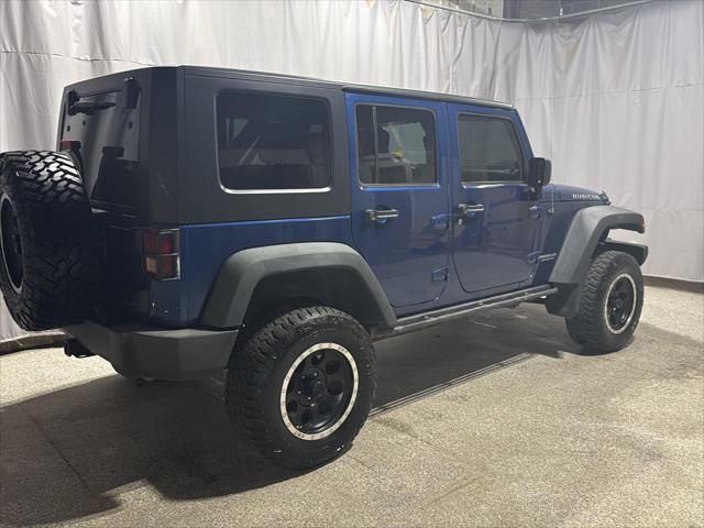 used 2010 Jeep Wrangler Unlimited car, priced at $13,995