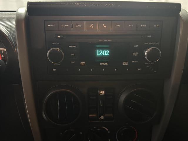 used 2010 Jeep Wrangler Unlimited car, priced at $13,995