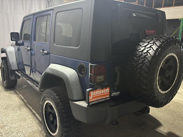used 2010 Jeep Wrangler Unlimited car, priced at $13,995