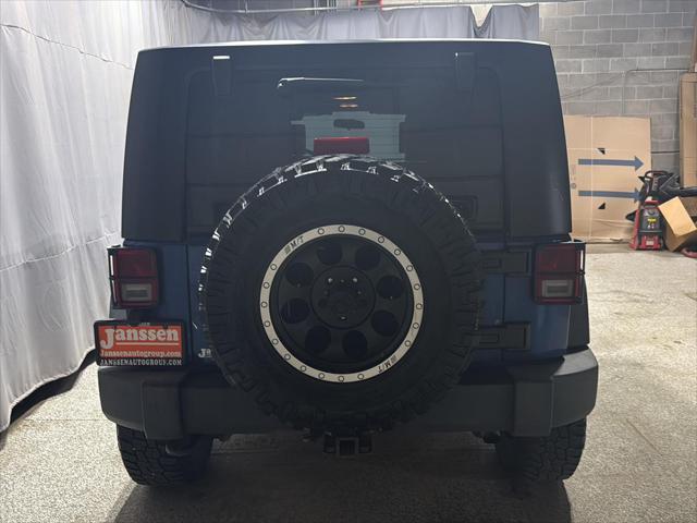 used 2010 Jeep Wrangler Unlimited car, priced at $13,995
