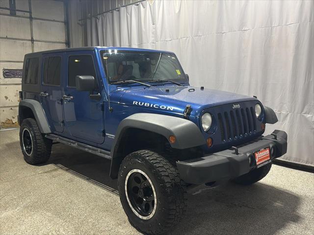 used 2010 Jeep Wrangler Unlimited car, priced at $13,995
