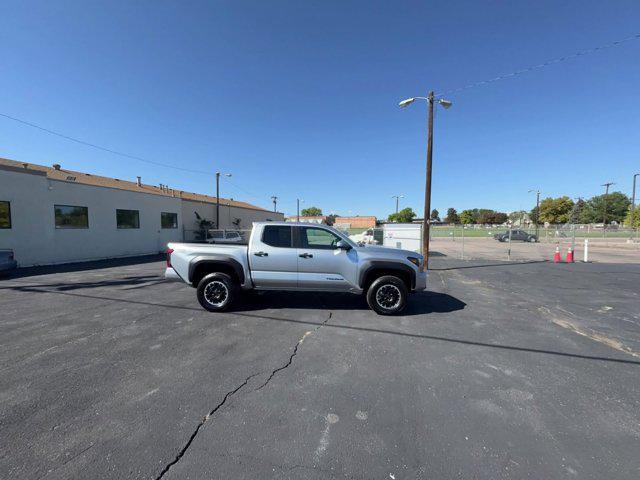 used 2025 Toyota Tacoma car, priced at $43,138