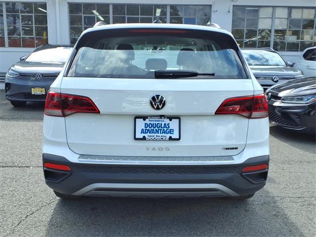 used 2023 Volkswagen Taos car, priced at $23,867