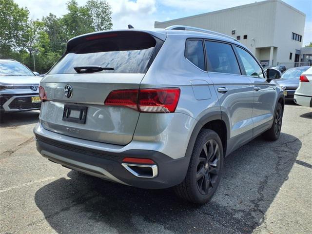 used 2023 Volkswagen Taos car, priced at $25,677