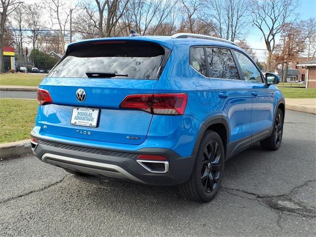 used 2022 Volkswagen Taos car, priced at $23,148