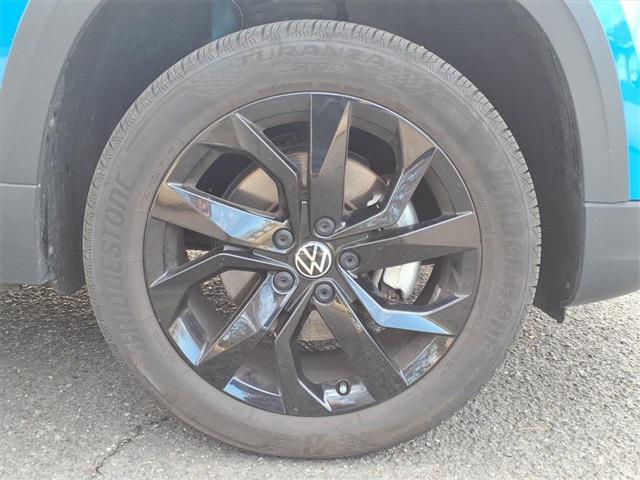 used 2022 Volkswagen Taos car, priced at $23,148